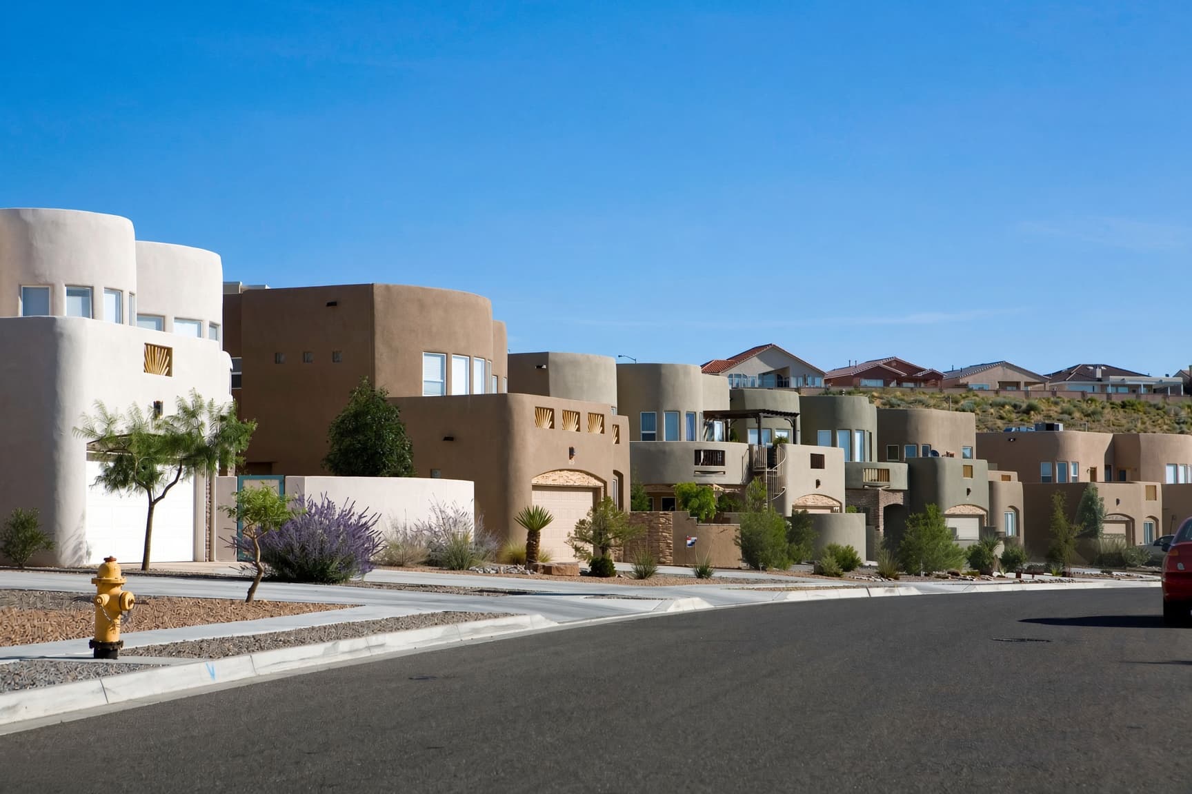 Neutral, HOA-approved window film installed on a home in an Albuquerque community, New Mexico